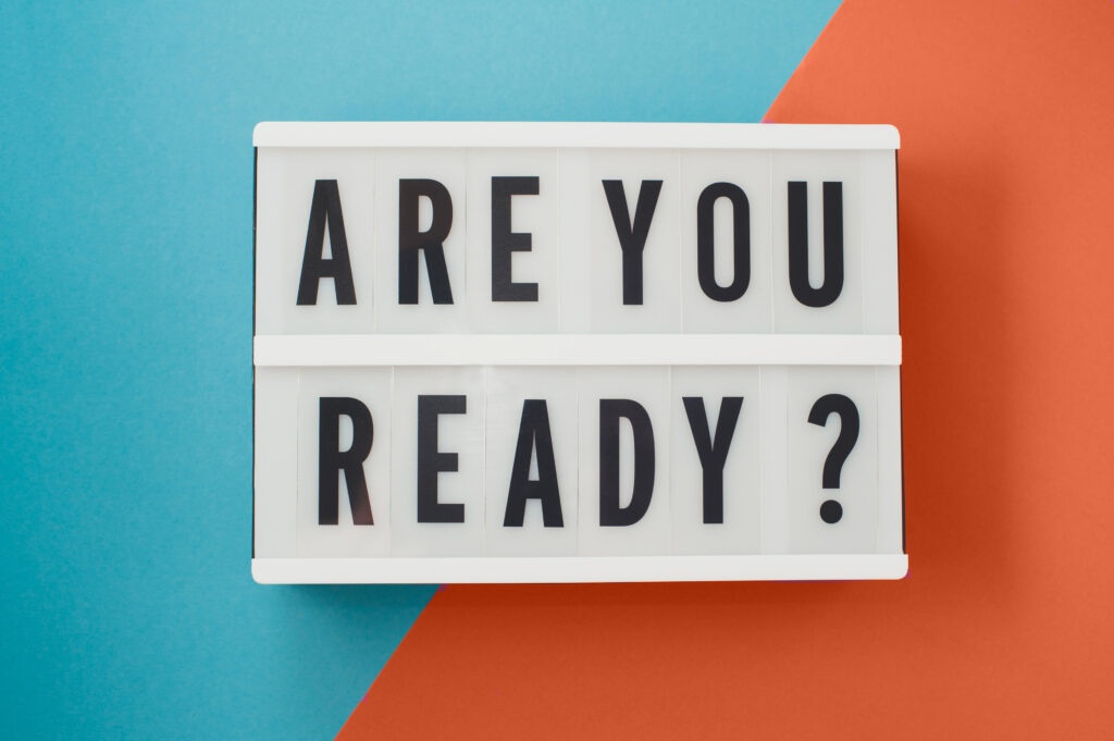 are you ready text on a display on blue and pink bright backgr